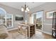 Dining area boasting a high-top table, bar stools, and sliding door to the patio at 4709 Wild Iris Dr. # 305, Myrtle Beach, SC 29577