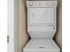 Efficient stacked washer and dryer unit, perfect for saving space and time on laundry days at 4709 Wild Iris Dr. # 305, Myrtle Beach, SC 29577