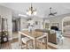 Open living space with a dining area, kitchen access, and comfortable seating at 4709 Wild Iris Dr. # 305, Myrtle Beach, SC 29577