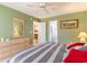 Comfortable bedroom featuring a ceiling fan, neutral paint and a large closet at 478 Pinehurst Ln. # 17D, Pawleys Island, SC 29585