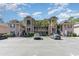 Inviting condo complex featuring covered balconies, lush landscaping and ample parking at 478 Pinehurst Ln. # 17D, Pawleys Island, SC 29585