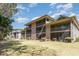 Building exterior showing spacious screened-in porches perfect for relaxing and enjoying the outdoors at 478 Pinehurst Ln. # 17D, Pawleys Island, SC 29585