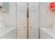 A clean laundry room with a washer and dryer, providing a functional space for laundry chores at 478 Pinehurst Ln. # 17D, Pawleys Island, SC 29585