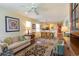 Inviting living room with comfortable seating, a ceiling fan, and open access to the kitchen at 478 Pinehurst Ln. # 17D, Pawleys Island, SC 29585