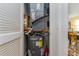 Utility room containing a water heater and HVAC system, ensuring efficient home maintenance at 478 Pinehurst Ln. # 17D, Pawleys Island, SC 29585