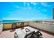 Relaxing balcony offering stunning ocean views and comfortable outdoor furniture at 5300 N Ocean Blvd. # 708, Myrtle Beach, SC 29577
