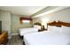 Comfortable bedroom featuring two queen-size beds and cozy decor at 5300 N Ocean Blvd. # 708, Myrtle Beach, SC 29577