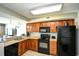 Bright kitchen featuring stainless steel appliances and ample cabinet space at 5300 N Ocean Blvd. # 708, Myrtle Beach, SC 29577