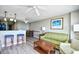 Cozy living room adjoining a dining area, featuring comfortable seating and a serene, inviting atmosphere at 5300 N Ocean Blvd. # 708, Myrtle Beach, SC 29577