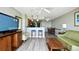 Living room seamlessly connected to a dining area, creating an open and inclusive living space at 5300 N Ocean Blvd. # 708, Myrtle Beach, SC 29577