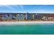 Expansive beachfront featuring condos, sandy beach, and sparkling ocean waters, inviting visitors to a serene coastal getaway at 5308 N Ocean Blvd. # 503, Myrtle Beach, SC 29577