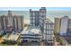 High-rise condo building with ocean view, showcasing modern architecture and convenient parking, perfect for coastal living at 5308 N Ocean Blvd. # 503, Myrtle Beach, SC 29577