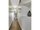 Hallway with wood floors and neutral walls, offering a glimpse into a stylish interior at 5308 N Ocean Blvd. # 503, Myrtle Beach, SC 29577