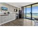 Cozy kitchen with modern appliances, including a microwave and refrigerator, with a balcony ocean view at 5308 N Ocean Blvd. # 503, Myrtle Beach, SC 29577