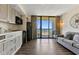 Comfortable living space with a kitchenette and balcony offering beautiful ocean views at 5308 N Ocean Blvd. # 503, Myrtle Beach, SC 29577