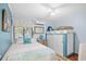 Cozy bedroom with beachy decor, comfortable bedding, and a view of the ocean through the window at 5601 N Ocean Blvd. # C-311, Myrtle Beach, SC 29577