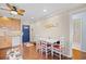 View of dining table area with access to a full bath and kitchen at 5601 N Ocean Blvd. # C-311, Myrtle Beach, SC 29577