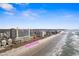 Aerial view of a beachfront condo with direct beach access at 5700 N Ocean Blvd. # 1107, North Myrtle Beach, SC 29582