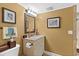Traditional bathroom features a framed mirror and granite countertop at 5700 N Ocean Blvd. # 1107, North Myrtle Beach, SC 29582