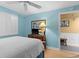 Relaxing bedroom in soft light blue with television and beach decor at 5700 N Ocean Blvd. # 1107, North Myrtle Beach, SC 29582