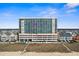 Exterior view of a high-rise condo building with ocean views and a community pool at 5700 N Ocean Blvd. # 1107, North Myrtle Beach, SC 29582
