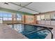 Inviting indoor pool with large windows and a relaxed, comfortable atmosphere for year-round enjoyment at 5700 N Ocean Blvd. # 1107, North Myrtle Beach, SC 29582