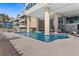 Resort style pool surrounded by lounge chairs, offering a luxurious space to relax and soak up the sun at 5700 N Ocean Blvd. # 1107, North Myrtle Beach, SC 29582