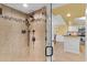 Walk-in shower with decorative tile accents at 5700 N Ocean Blvd. # 1107, North Myrtle Beach, SC 29582