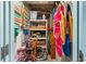 Organized storage unit with beach chairs, bikes, and bins offer ample space for outdoor essentials at 5700 N Ocean Blvd. # 1107, North Myrtle Beach, SC 29582