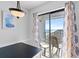 Balcony view with chairs overlooking the ocean, accessible from the adjacent dining area at 5905 South Kings Hwy. # 1708, Myrtle Beach, SC 29575