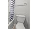 Clean bathroom featuring a toilet, bathtub, and shower with a striped curtain at 5905 South Kings Hwy. # 1708, Myrtle Beach, SC 29575