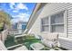 This cozy balcony features striped furniture, perfect for relaxing outdoors at 600-B 43Rd Ave. S, North Myrtle Beach, SC 29582
