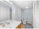 Bathroom with a large mirror, storage under the sink, and a walk-in shower at 600-B 43Rd Ave. S, North Myrtle Beach, SC 29582