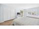 Bedroom featuring two queen beds, closet with mirrored doors, and a balcony at 600-B 43Rd Ave. S, North Myrtle Beach, SC 29582