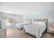 Bright bedroom with two queen beds and lots of natural light streaming in through a window at 600-B 43Rd Ave. S, North Myrtle Beach, SC 29582