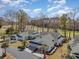 Aerial view of white villas with green roofs nestled in a golf course community at 640 Intracoastal Way # 640, Myrtle Beach, SC 29579