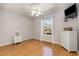 Bedroom with wood floors, a window, and wicker furnishings at 640 Intracoastal Way # 640, Myrtle Beach, SC 29579