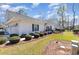 Exterior view of home with green shutters, landscaped yard, and attached garage at 640 Intracoastal Way # 640, Myrtle Beach, SC 29579