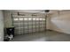 Spacious two car garage with a garage door and concrete flooring at 640 Intracoastal Way # 640, Myrtle Beach, SC 29579