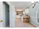 Open kitchen featuring a breakfast bar with seating and white cabinetry for ample storage at 640 Intracoastal Way # 640, Myrtle Beach, SC 29579