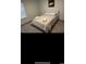 Cozy bedroom featuring a queen-sized bed with plush bedding, side window and carpeted floors at 645 Black Pearl Way, Myrtle Beach, SC 29588