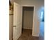 View of closet for storage, featuring an open doorway and carpet flooring at 645 Black Pearl Way, Myrtle Beach, SC 29588