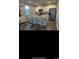 Modern kitchen featuring granite countertops, stainless steel appliances, and a large island with bar seating at 645 Black Pearl Way, Myrtle Beach, SC 29588