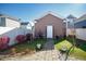 Backyard featuring a lawn and a building with brown siding at 676 Johnson Ave., Myrtle Beach, SC 29577