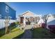 Backyard featuring a lawn, a stone path, and a patio at 676 Johnson Ave., Myrtle Beach, SC 29577
