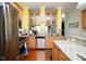 Bright kitchen with stainless steel appliances and granite countertops featuring bar seating area at 676 Johnson Ave., Myrtle Beach, SC 29577
