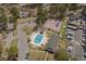 Aerial view of community pool, tennis courts, playground, parking and other amenities at 6904 Gina Ct., Myrtle Beach, SC 29588