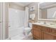 Cozy bathroom with a shower-tub combo, single sink vanity, and a neutral color scheme for a relaxing atmosphere at 77 Tern Pl. # 202, Pawleys Island, SC 29585
