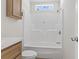 Renovated bathroom features a shower-tub combination and a new modern vanity at 909 Pine Thicket St., Myrtle Beach, SC 29577