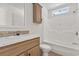 Bathroom with updated vanity, toilet, and shower/bath combo at 909 Pine Thicket St., Myrtle Beach, SC 29577